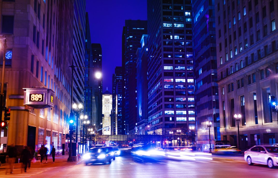 Chicago nightlife scene of road and traffic.